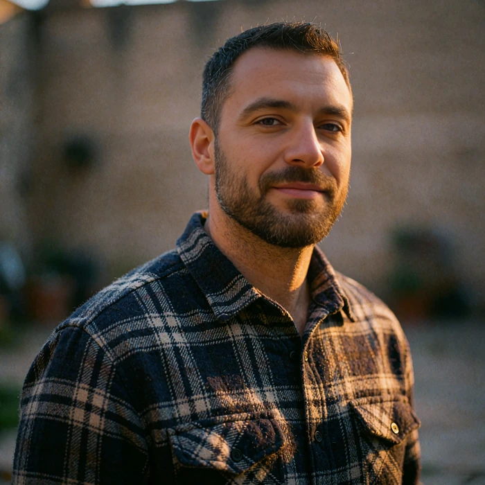 Portrait of a bearded man in a plaid flannel shirt, illustrating a quick free Selunion dating signup